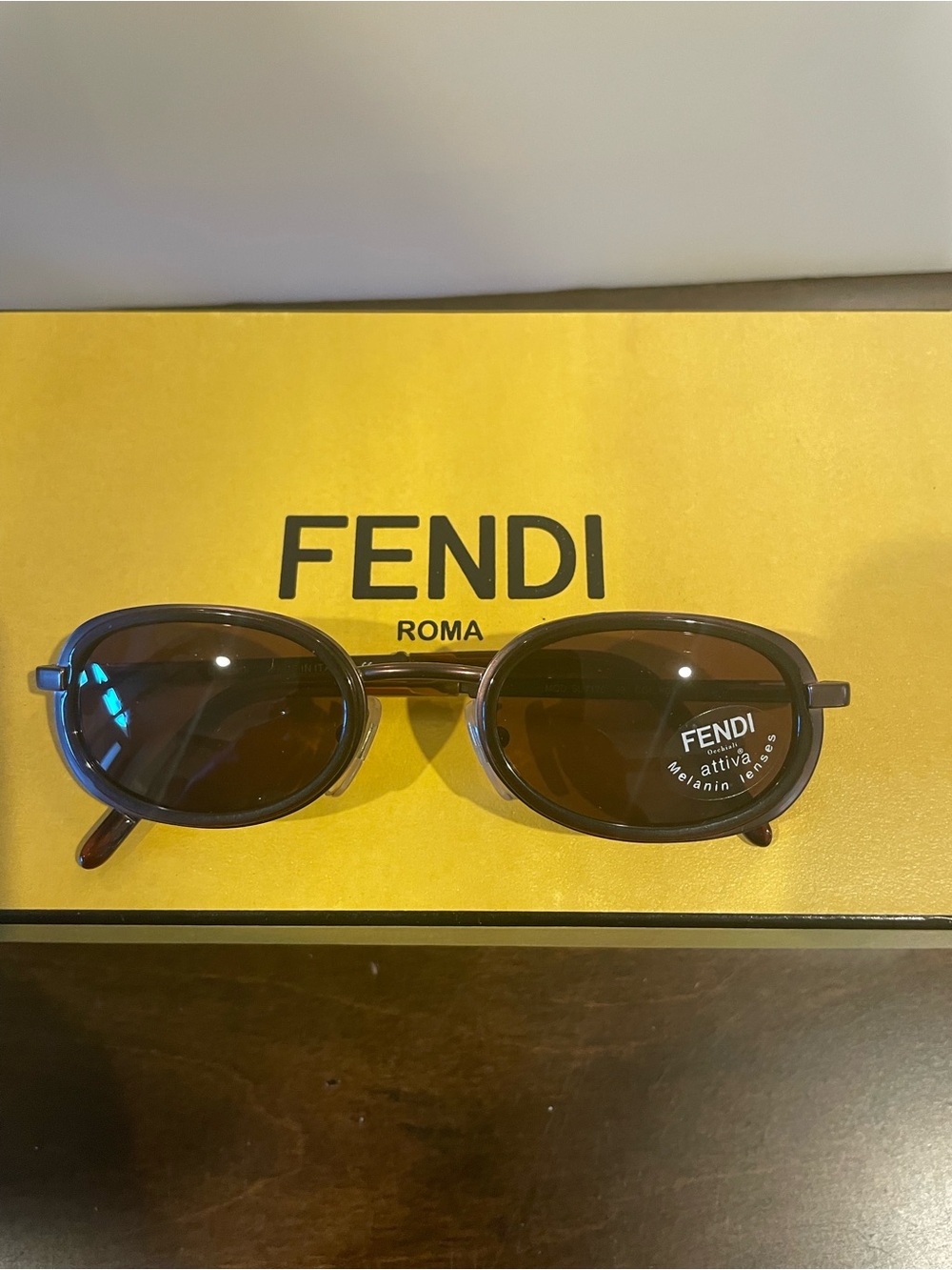 Fendi Brown Oval Sunglasses with Dark Lenses